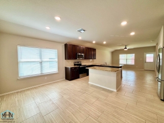 A Stunning Modern Home with Open Floor Plan and Abundant Natural Light!