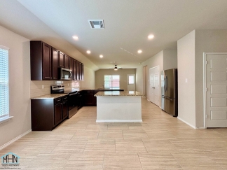 A Stunning Modern Home with Open Floor Plan and Abundant Natural Light!