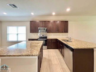 A Stunning Modern Home with Open Floor Plan and Abundant Natural Light!