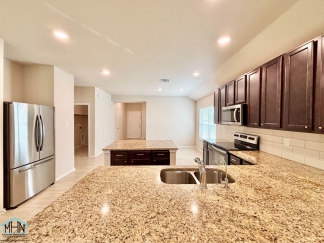 A Stunning Modern Home with Open Floor Plan and Abundant Natural Light!
