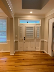 Charming two story home on a tree lined street.