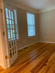 Charming two story home on a tree lined street.