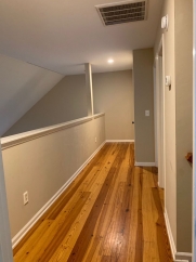 Charming two story home on a tree lined street.