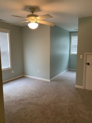 Charming two story home on a tree lined street.