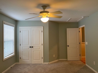 Charming two story home on a tree lined street.