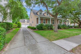 Charming two story home on a tree lined street.