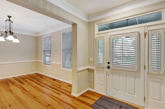 Charming two story home on a tree lined street.