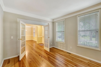 Charming two story home on a tree lined street.