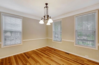 Charming two story home on a tree lined street.