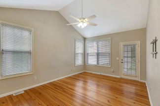 Charming two story home on a tree lined street.