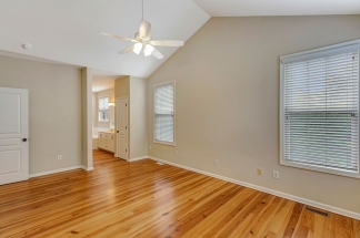 Charming two story home on a tree lined street.