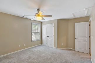 Charming two story home on a tree lined street.