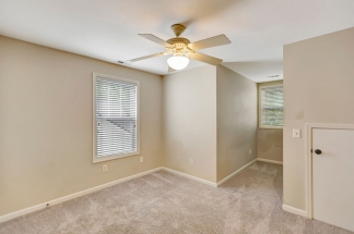 Charming two story home on a tree lined street.