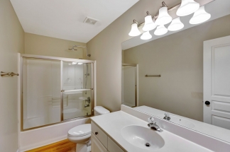 Charming two story home on a tree lined street.