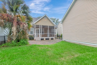 Charming two story home on a tree lined street.