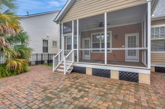 Charming two story home on a tree lined street.