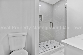 Live Elevated in the Heart of Viridian – Stunning Island Townhome!