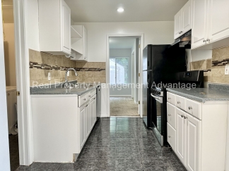 Mid-Century Ranch Boasts 3 Large Bedrooms and Central Location