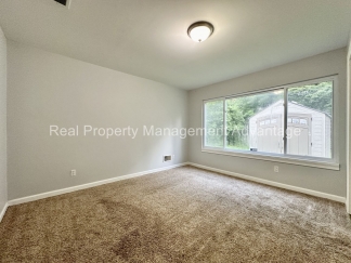 Mid-Century Ranch Boasts 3 Large Bedrooms and Central Location
