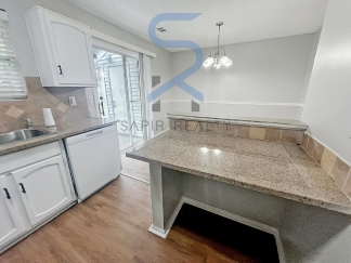5749 Wells Cir - Sizzling Summer Steal! Move in by Aug 15th and choose your reward — a FREE 55 Smart TV or a $250 Amazon gift card, on us! Don’t miss out!