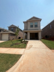 A thoughtfully designed two-story home with low-maintenance appeal!