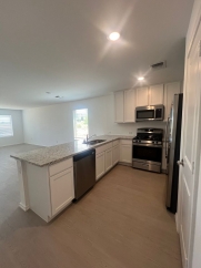 A thoughtfully designed two-story home with low-maintenance appeal!