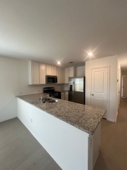 A thoughtfully designed two-story home with low-maintenance appeal!