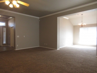 Available NOW! 18-Month Lease Offer!!  Beautiful Home in Yukon Near Turnpike! Includes Storm Shelter!