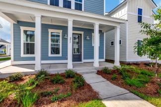 "Resort-Style Living Begins Right at Your Front Porch!"