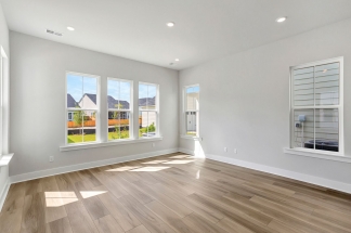 "Resort-Style Living Begins Right at Your Front Porch!"