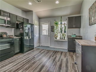 Absolutely Darling 4 Bed Home in Highly Desired Mustang Schools with Storm Shelter!!!