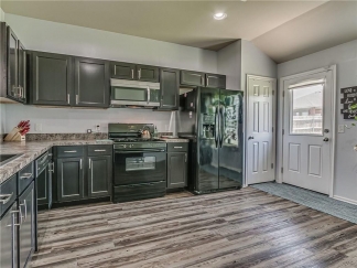 Absolutely Darling 4 Bed Home in Highly Desired Mustang Schools with Storm Shelter!!!