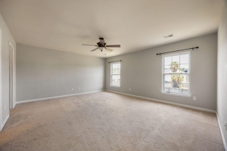 Your Perfect Moss Grove Retreat: Open Living, Screened Patio & Private Yard