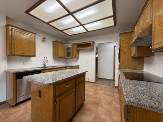 Spacious 3-Bed, 2-Bath Brick Home with Fireplace & Private Fenced Yard