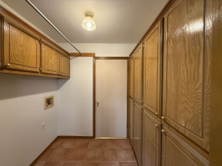 Spacious 3-Bed, 2-Bath Brick Home with Fireplace & Private Fenced Yard