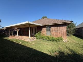 Spacious 3-Bed, 2-Bath Brick Home with Fireplace & Private Fenced Yard
