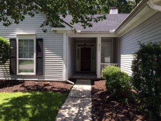 Great house with a corner fireplace that can be viewed from the kitchen and the family room.