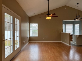 Great house with a corner fireplace that can be viewed from the kitchen and the family room.