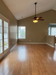 Great house with a corner fireplace that can be viewed from the kitchen and the family room.