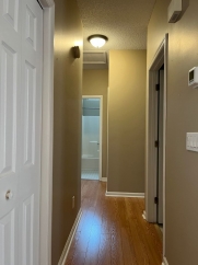 Great house with a corner fireplace that can be viewed from the kitchen and the family room.