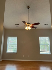 Great house with a corner fireplace that can be viewed from the kitchen and the family room.