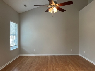 Great house with a corner fireplace that can be viewed from the kitchen and the family room.