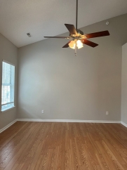 Great house with a corner fireplace that can be viewed from the kitchen and the family room.