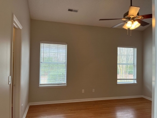 Great house with a corner fireplace that can be viewed from the kitchen and the family room.