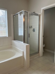 Great house with a corner fireplace that can be viewed from the kitchen and the family room.