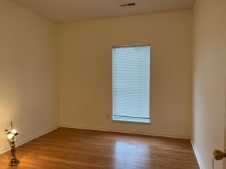 Great house with a corner fireplace that can be viewed from the kitchen and the family room.