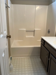 Great house with a corner fireplace that can be viewed from the kitchen and the family room.