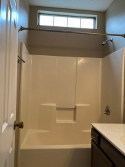 Great house with a corner fireplace that can be viewed from the kitchen and the family room.