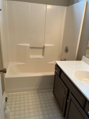 Great house with a corner fireplace that can be viewed from the kitchen and the family room.