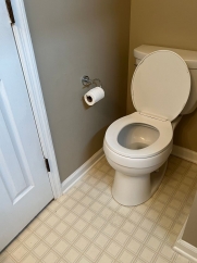 Great house with a corner fireplace that can be viewed from the kitchen and the family room.